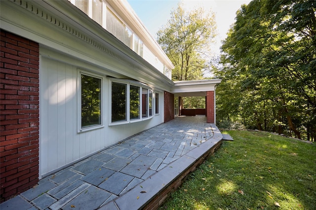 94 Cedar Ave, Poughkeepsie, NY 12603 - wooden terrace with a yard and a patio area