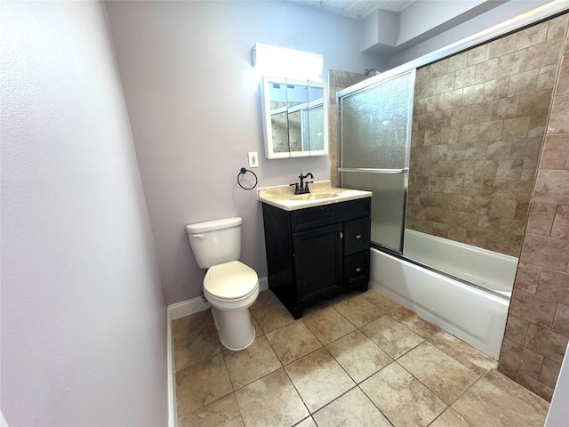 221 Bch 80th St Unit 2J, Rockaway Beach, NY 11693 - bathroom with vanity, tile patterned floors, toilet, bath / shower combo with glass door, and baseboards