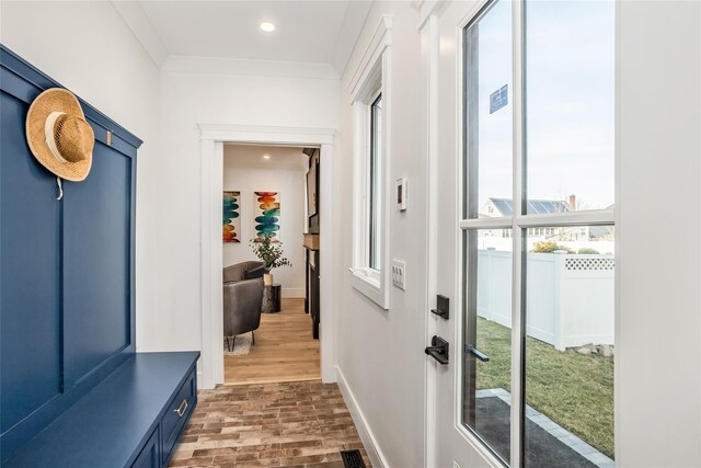 45 Mist Ln, Westbury, NY 11590 - mudroom with recessed lighting, baseboards, and crown molding