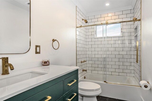 45 Mist Ln, Westbury, NY 11590 - bathroom featuring vanity, combined bath / shower with glass door, toilet, tile patterned floors, and recessed lighting