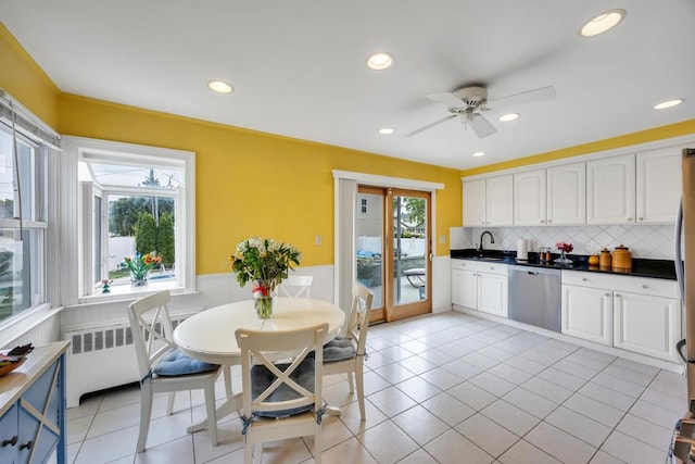 86 Woodbine Dr N, Hicksville, NY 11801 - kitchen with dishwasher, a wainscoted wall, white cabinets, a ceiling fan, and recessed lighting