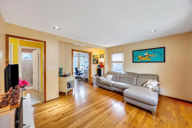 86 Woodbine Dr N, Hicksville, NY 11801 - living area with light wood-type flooring and recessed lighting