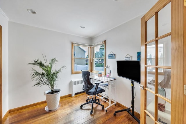 86 Woodbine Dr N, Hicksville, NY 11801 - home office featuring radiator heating unit, wood finished floors, ornamental molding, and recessed lighting
