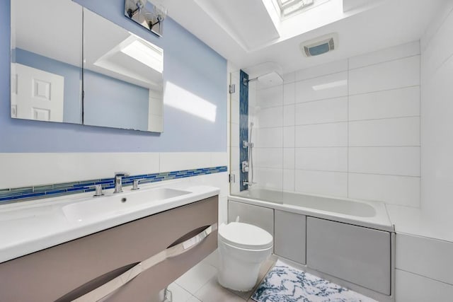 86 Woodbine Dr N, Hicksville, NY 11801 - full bath with tile walls, vanity, shower / tub combination, and tile patterned floors
