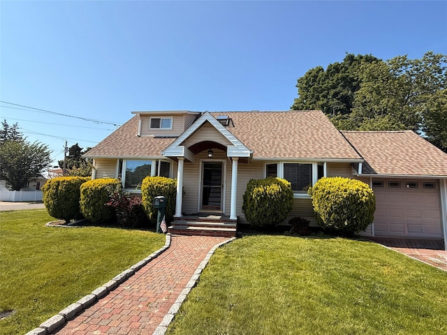 7 Ronald Ave, Hicksville, NY 11801 - view of front of house with roof with shingles, an attached garage, and a front yard