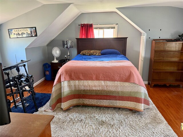 7 Ronald Ave, Hicksville, NY 11801 - bedroom featuring wood finished floors and lofted ceiling