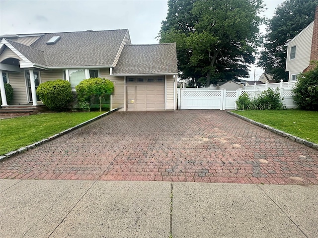7 Ronald Ave, Hicksville, NY 11801 - view of side of home with decorative driveway, roof with shingles, and an attached garage