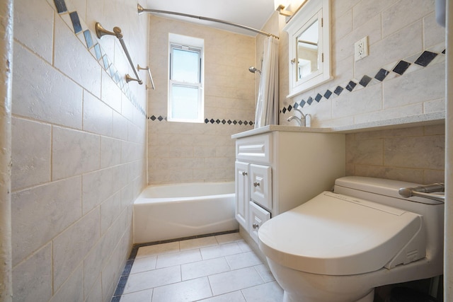 103-26 68th Ave Unit 2E, Forest Hills, NY 11375 - full bathroom with tile walls, tile patterned flooring, shower / tub combo with curtain, vanity, and toilet