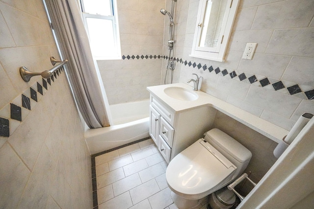 103-26 68th Ave Unit 2E, Forest Hills, NY 11375 - bathroom featuring tile walls, shower / bathtub combination with curtain, tile patterned floors, toilet, and vanity