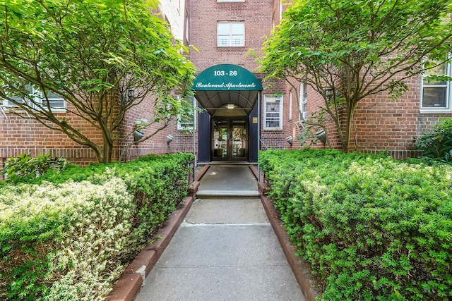 103-26 68th Ave Unit 2E, Forest Hills, NY 11375 - entrance to property featuring french doors and brick siding