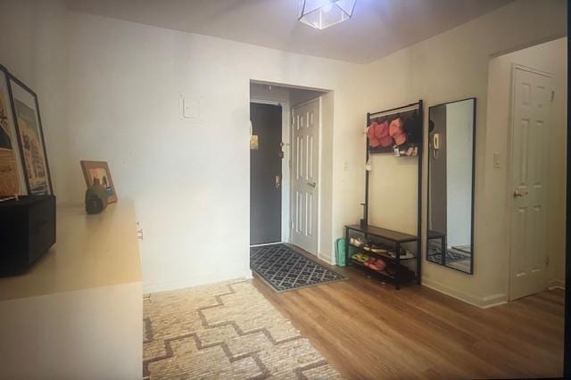 50 Brompton Unit 3K, Great Neck, NY 11021 - entrance foyer with wood finished floors and baseboards