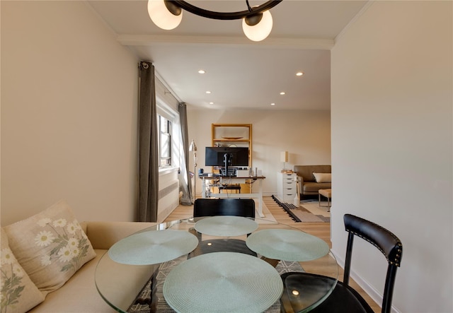 50 Brompton Unit 3K, Great Neck, NY 11021 - dining area with crown molding, recessed lighting, and light wood-style flooring
