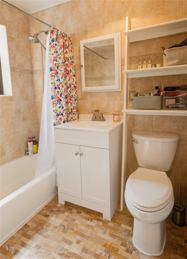 50 Brompton Unit 3K, Great Neck, NY 11021 - full bathroom featuring tile walls, toilet, shower / bathtub combination with curtain, and vanity