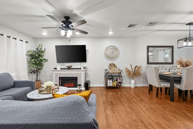 45 Maple Dr, Stony Point, NY 10980 - living room featuring a ceiling fan, wood finished floors, recessed lighting, a fireplace, and baseboards