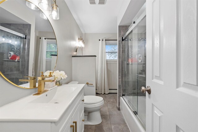 45 Maple Dr, Stony Point, NY 10980 - bathroom featuring vanity, toilet, healthy amount of natural light, and shower / bath combination with glass door