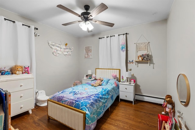 45 Maple Dr, Stony Point, NY 10980 - bedroom with baseboard heating, wood finished floors, and a ceiling fan