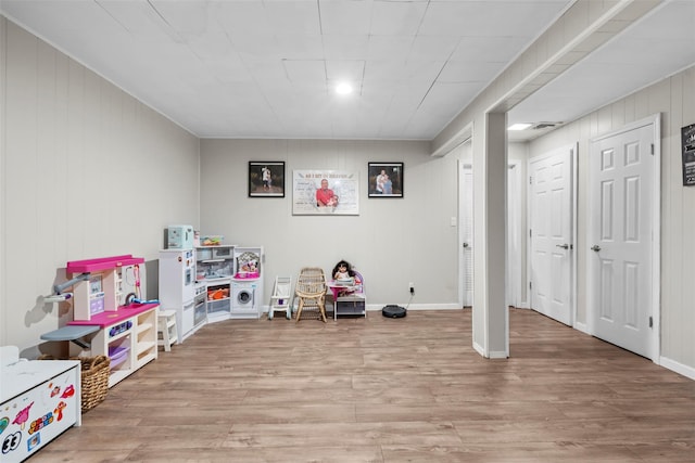 45 Maple Dr, Stony Point, NY 10980 - recreation room with wood finished floors, baseboards, and wood walls