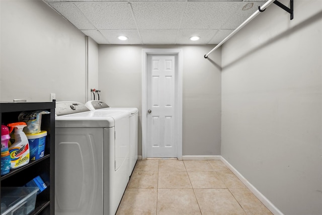 45 Maple Dr, Stony Point, NY 10980 - laundry room with separate washer and dryer, light tile patterned floors, and baseboards