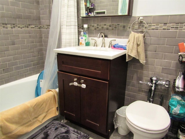 88-25 155th Unit 2M, Howard Beach, NY 11414 - bathroom featuring tile walls, vanity, shower / bath combination with curtain, toilet, and tasteful backsplash