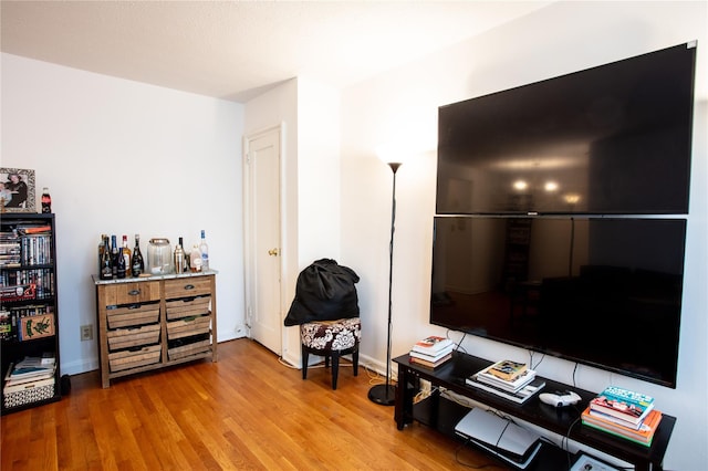 67-89 136th St Unit A, Kew Garden Hills, NY 11367 - sitting room with wood finished floors and baseboards