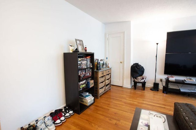 67-89 136th St Unit A, Kew Garden Hills, NY 11367 - interior space with light wood-style flooring and baseboards