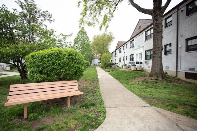 67-89 136th St Unit A, Kew Garden Hills, NY 11367 - view of property's community with a residential view and a yard
