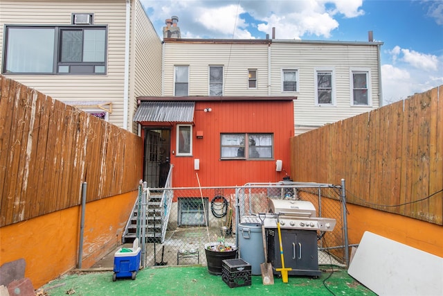 1321 Bristow St, Bronx, NY 10459 - back of house with a fenced backyard