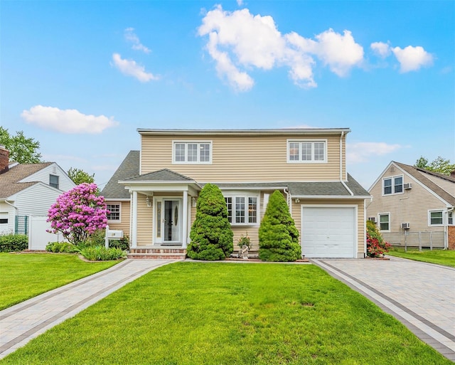 29 Underhill Ave, Syosset, NY 11791 - traditional-style home with decorative driveway and a garage