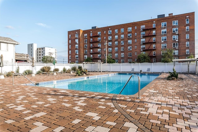 210 E Broadway Unit 1D, Long Beach, NY 11561 - community pool featuring a patio