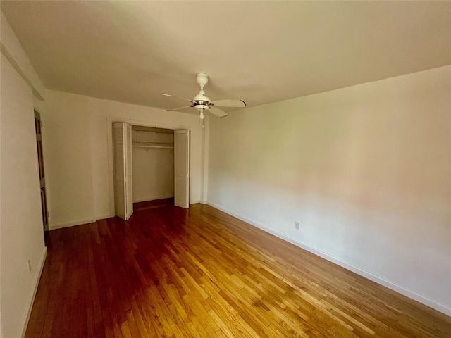 14340 41st Ave Unit 2G, Flushing, NY 11355 - unfurnished bedroom featuring wood finished floors, a closet, baseboards, and ceiling fan