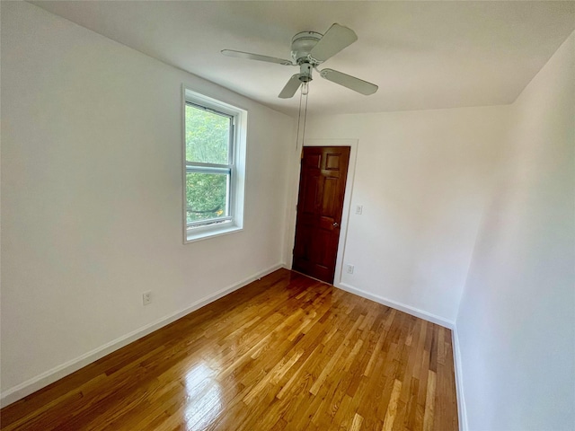 14340 41st Ave Unit 2G, Flushing, NY 11355 - unfurnished room with light wood-type flooring, baseboards, and a ceiling fan
