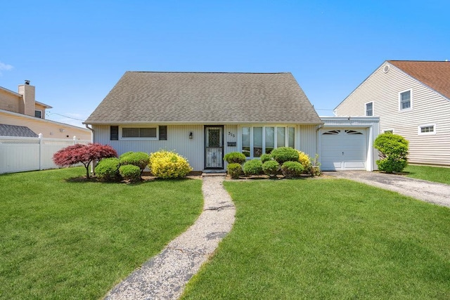 315 Fern Pl, Bethpage, NY 11714 - cape cod home featuring an attached garage, driveway, and roof with shingles