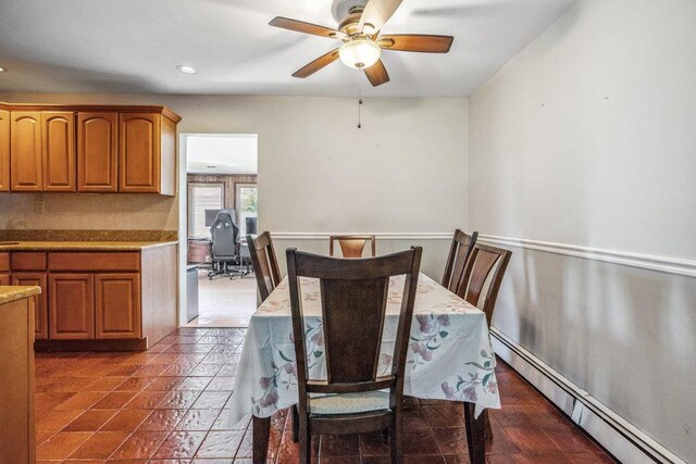 315 Fern Pl, Bethpage, NY 11714 - dining area featuring baseboard heating, a ceiling fan, and recessed lighting