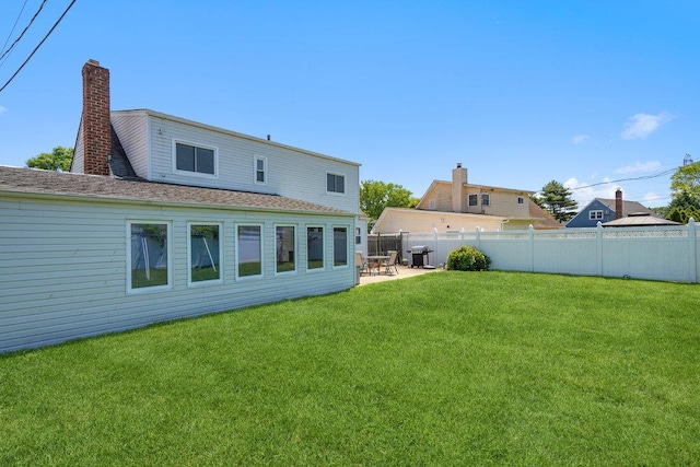 315 Fern Pl, Bethpage, NY 11714 - back of house with a patio area and a chimney