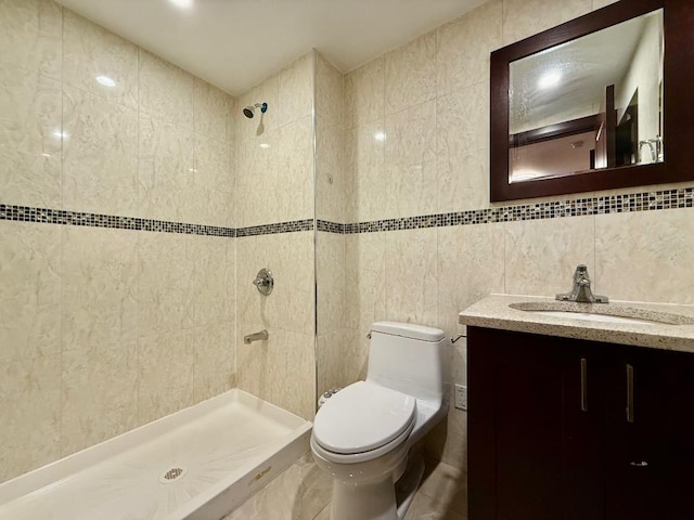 41-42 College Point Blvd Unit 3E, Flushing, NY 11355 - full bath featuring tile walls, a tile shower, vanity, and toilet