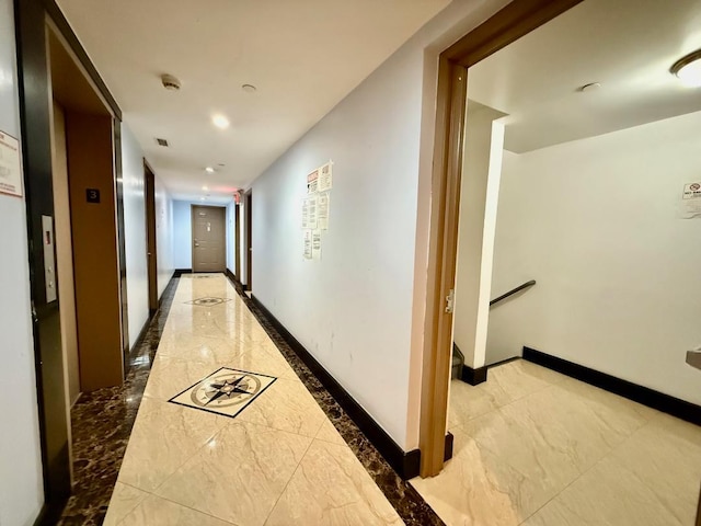 41-42 College Point Blvd Unit 3E, Flushing, NY 11355 - hall with light marble finish floors, baseboards, elevator, and recessed lighting
