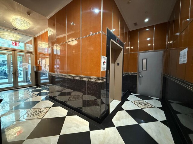 41-42 College Point Blvd Unit 3E, Flushing, NY 11355 - building lobby featuring ornamental molding