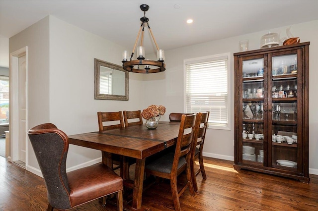 360 E Hudson St, Long Beach, NY 11561 - dining area with dark wood-style flooring, a chandelier, baseboards, and recessed lighting