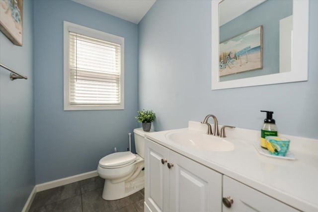 360 E Hudson St, Long Beach, NY 11561 - half bath featuring toilet, vanity, and baseboards