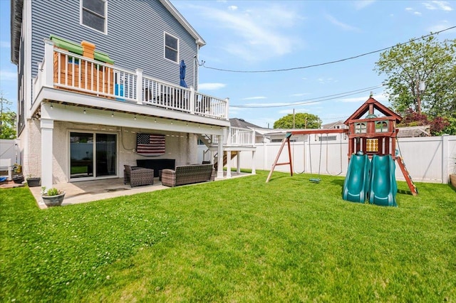 360 E Hudson St, Long Beach, NY 11561 - back of house featuring a patio area, a playground, an outdoor hangout area, and stucco siding