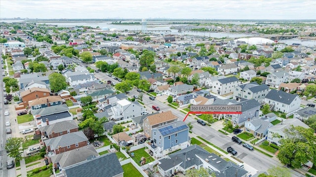 360 E Hudson St, Long Beach, NY 11561 - aerial overview of property's location with nearby suburban area and a nearby body of water