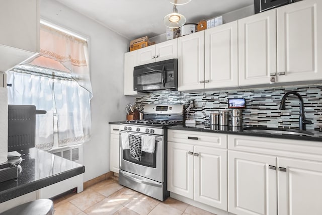 2 Cascade Ter Unit 1D, Yonkers, NY 10703 - kitchen featuring black microwave, stainless steel gas range oven, a sink, and tasteful backsplash