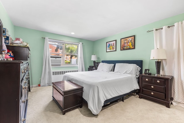 2 Cascade Ter Unit 1D, Yonkers, NY 10703 - bedroom with radiator, light carpet, and cooling unit