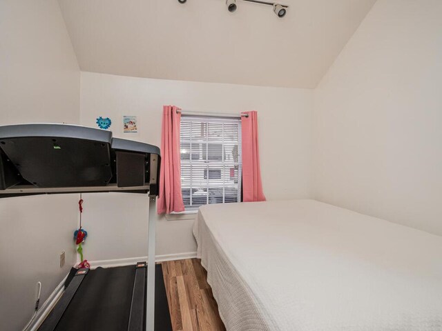 40 Mount Pleasant Rd, Yonkers, NY 10703 - bedroom featuring vaulted ceiling and wood finished floors