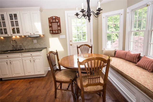 51 Regina Dr, Sayville, NY 11782 - dining area featuring dark wood-style flooring and a chandelier