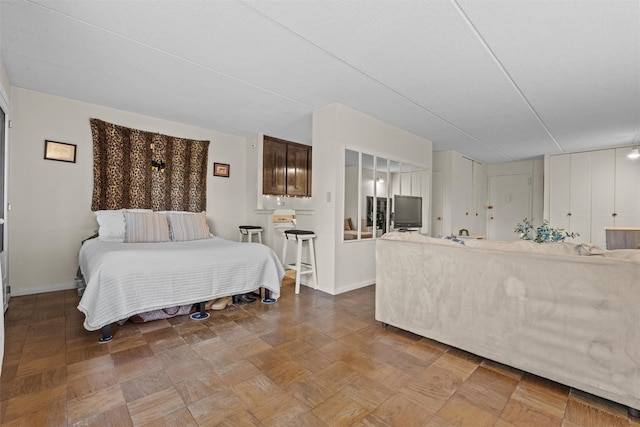 160 Academy St Unit 5C, Poughkeepsie, NY 12601 - bedroom featuring baseboards