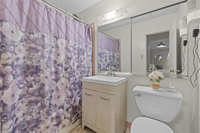 160 Academy St Unit 5C, Poughkeepsie, NY 12601 - full bathroom featuring toilet, vanity, curtained shower, tile patterned floors, and a textured ceiling