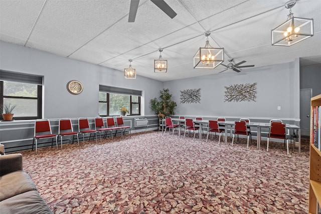160 Academy St Unit 5C, Poughkeepsie, NY 12601 - miscellaneous room featuring ceiling fan, a chandelier, and carpet floors