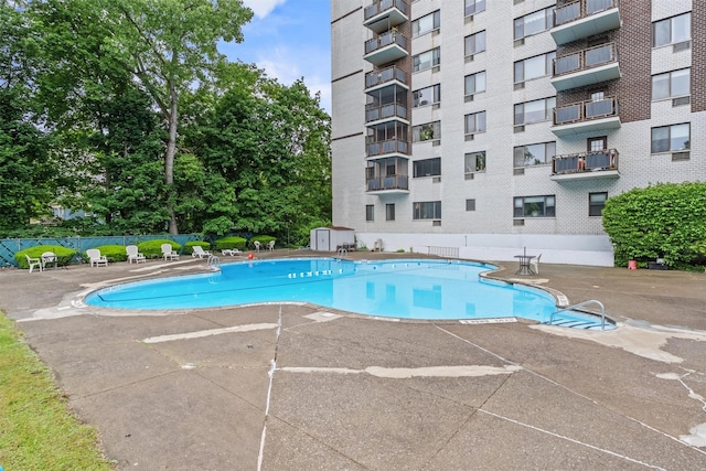 160 Academy St Unit 5C, Poughkeepsie, NY 12601 - community pool featuring a patio