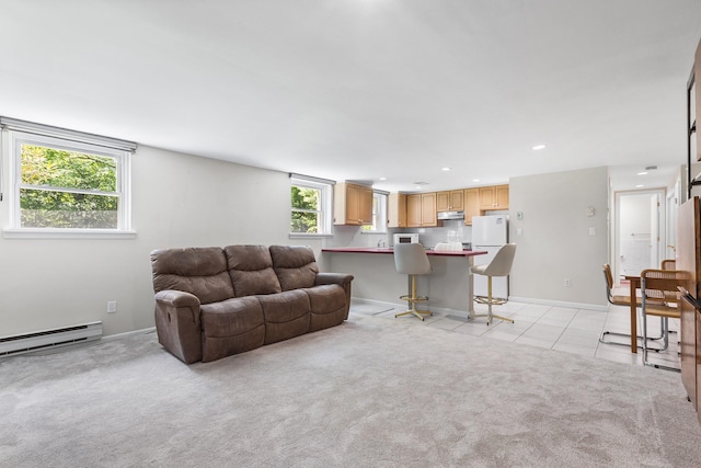 18 Halsey Pl, Valhalla, NY 10595 - living room featuring light tile patterned floors, recessed lighting, baseboards, light colored carpet, and baseboard heating